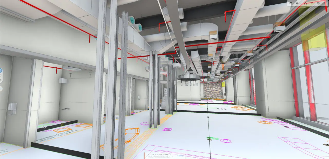 A digital architectural rendering of a building interior under construction. Exposed ductwork and red piping are overhead, with metal wall frames in place.